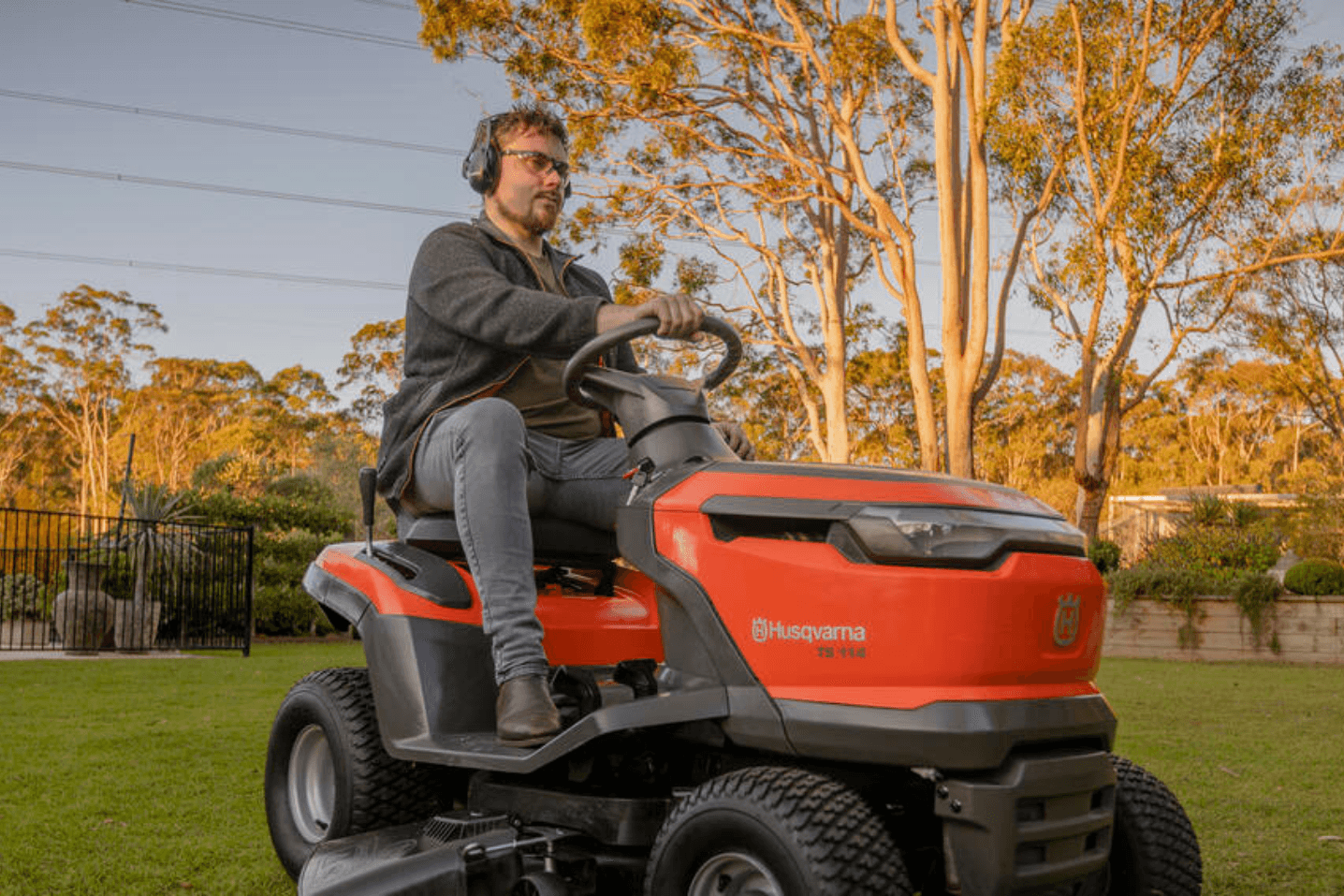 man on lawn tractor